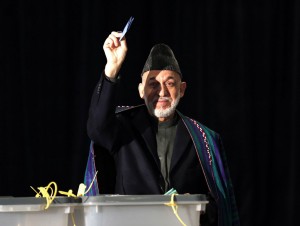 Afghan President Hamid Karzai casts his vote in Kabul