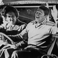 Ronald Reagan (R) and Margaret Thatcher wave after