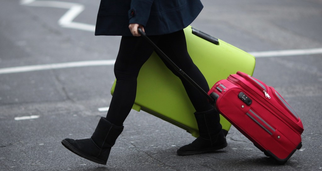 donna-emigrazione-e1402769990598