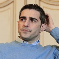 Mayor of Parma Pizzarotti, looks on during an interview with Reuters in Parma