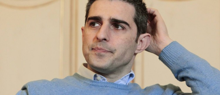 Mayor of Parma Pizzarotti, looks on during an interview with Reuters in Parma