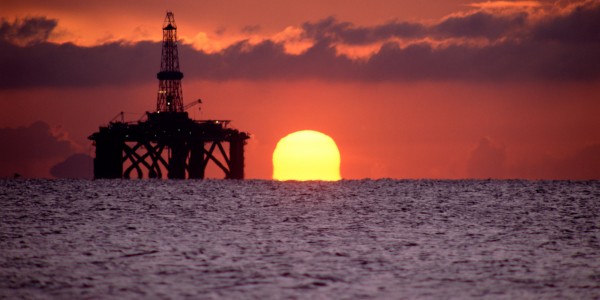 Oil rig at sunset